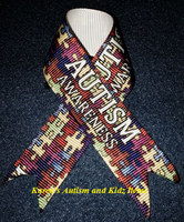 
              Ribbon Autism Awareness on pins
            