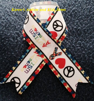 
              Ribbon Autism Awareness on pins
            