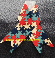 
              Ribbon Autism Awareness on pins
            