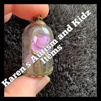 
              Flower in a bottle Necklace
            